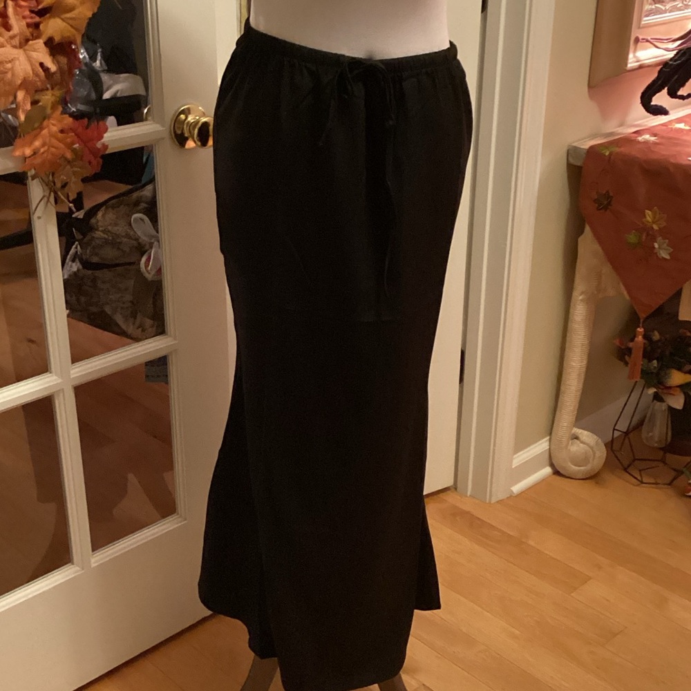 Elegant Black Maxi Skirt with drawstring waist slight flare at bottom.  NEW